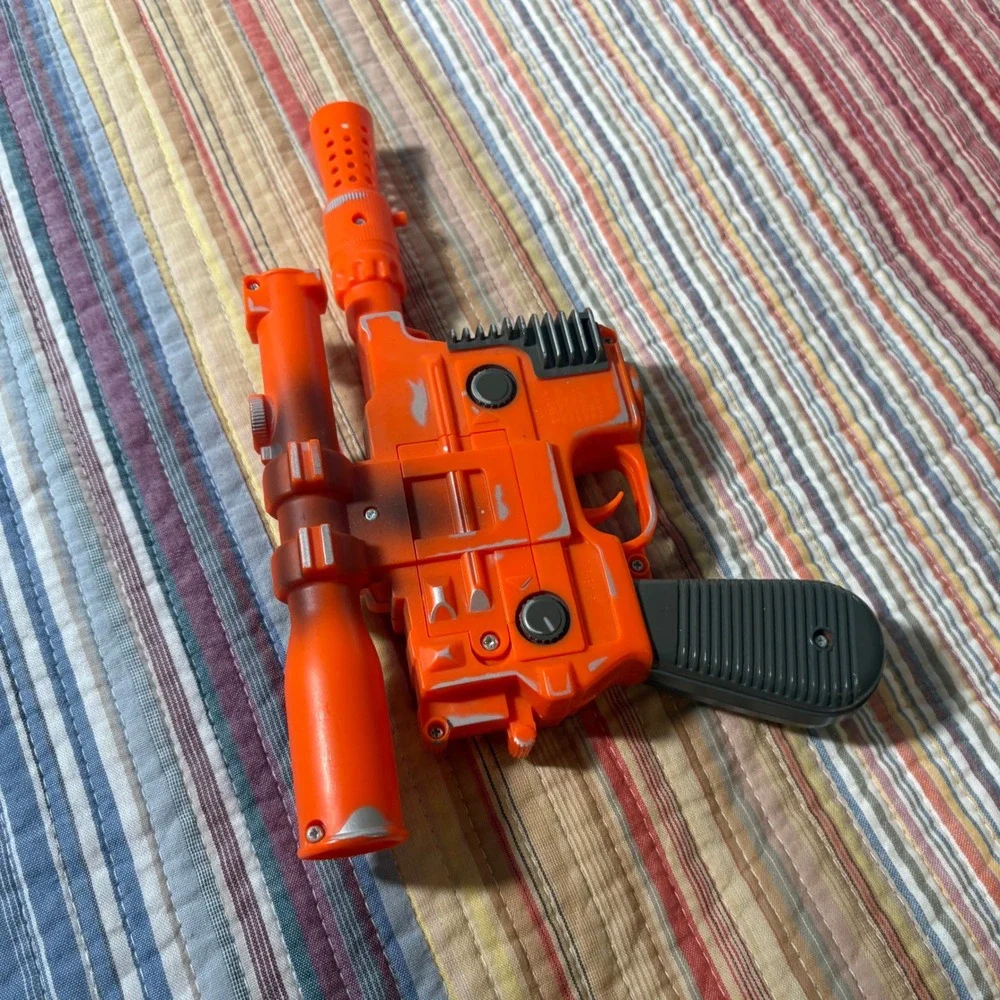 Disney Star Tours Star Wars Han Solo DL-44 Blaster Toy Orange Silver Weathered